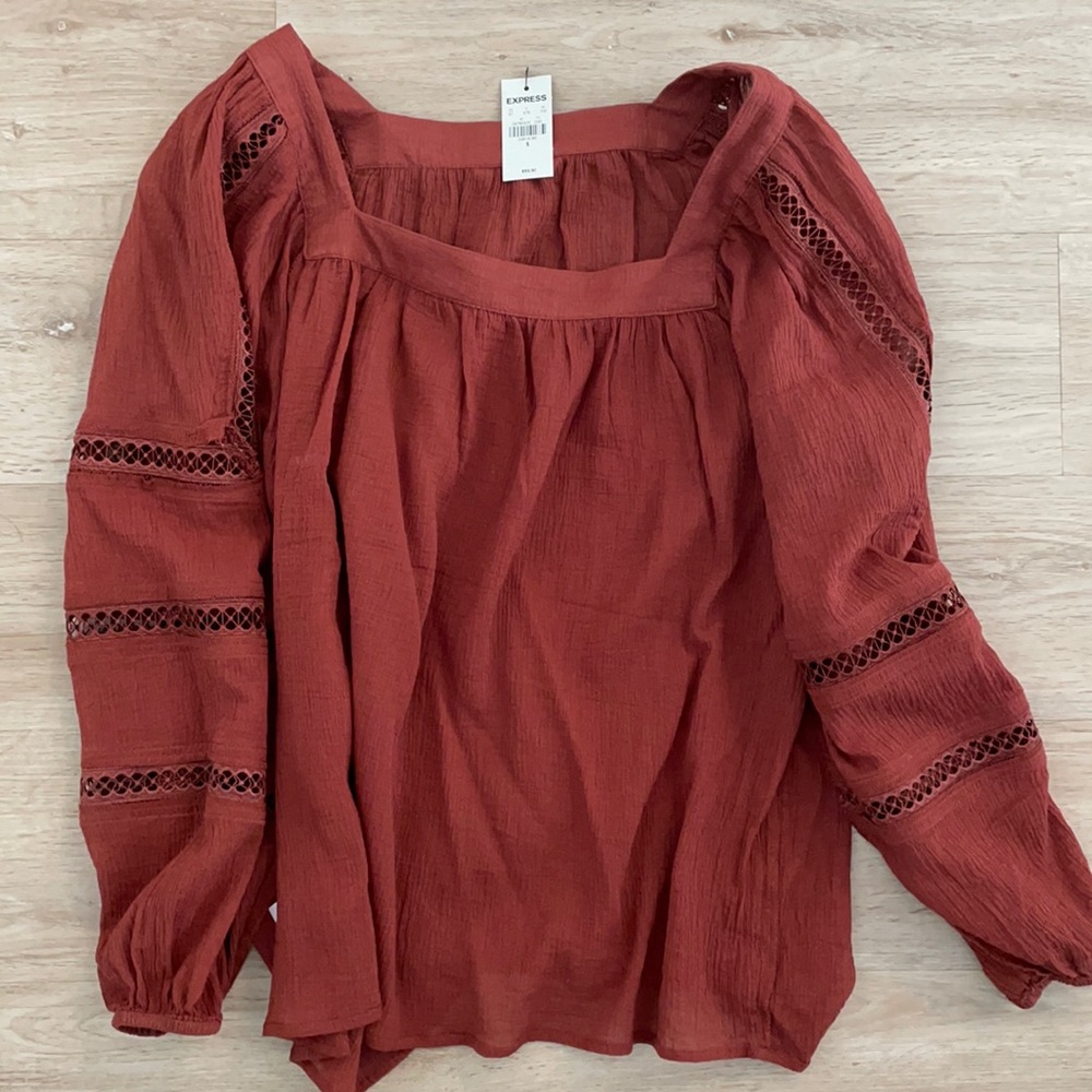 Beautiful rust color blouse from express